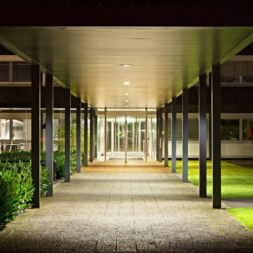 Roofed Office Building Entrance At Night